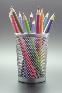 cup with array of colored pencils